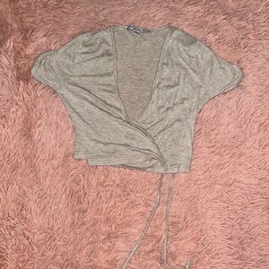 Tan crop top with tie.